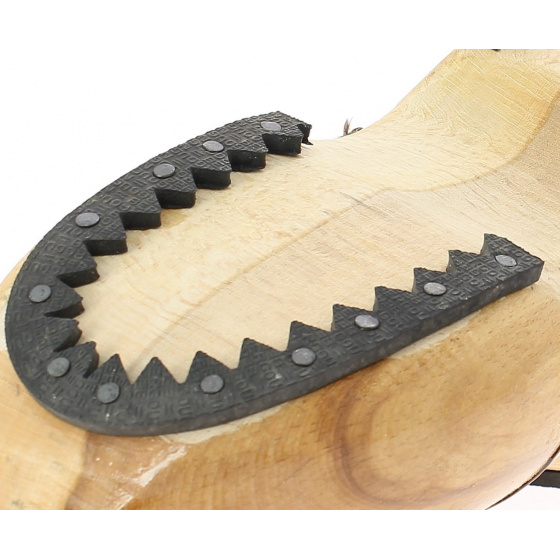 Varnished wooden clogs with soles